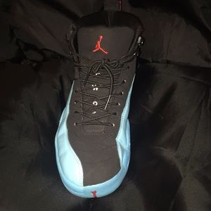 Size 7 and a half black and blue Jordan 12’s